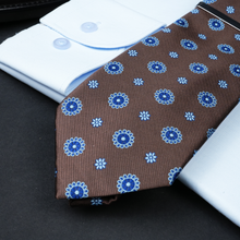 a close up of a tie on a table