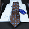 a close up of a tie and a dress shirt