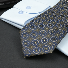 a close up of a tie on a table