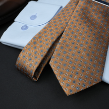 a close up of a tie on a table
