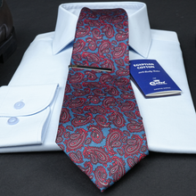 a red and blue tie with a blue book on it