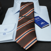 a close up of a tie and a shirt