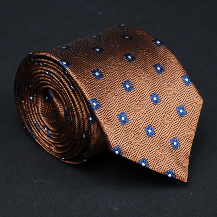 a close up of a tie on a black surface