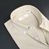 a close up of a shirt on a black surface