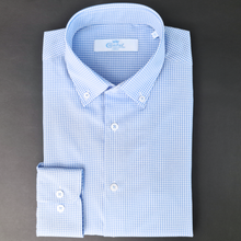 a blue and white checkered dress shirt