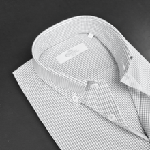 a black and white photo of a dress shirt