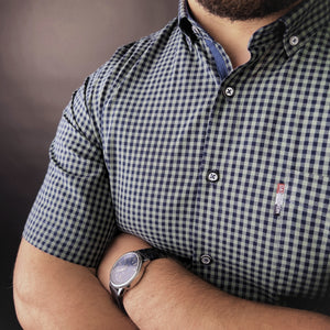 a man with a watch on his wrist