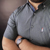 a man with a watch on his wrist