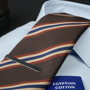 a close up of a tie and a shirt