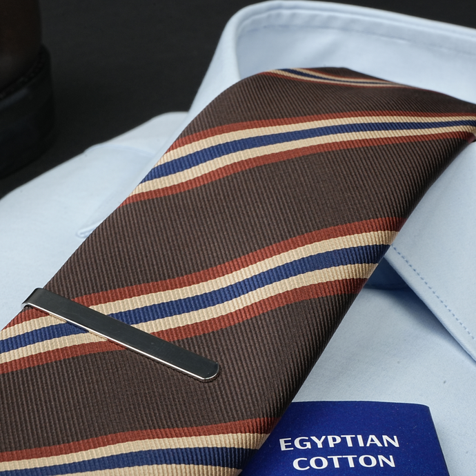 a close up of a tie and a shirt