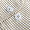 a close up of a button on a shirt