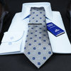 a white shirt and a tie with a blue tag