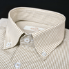 a brown and white checkered shirt with a button down collar