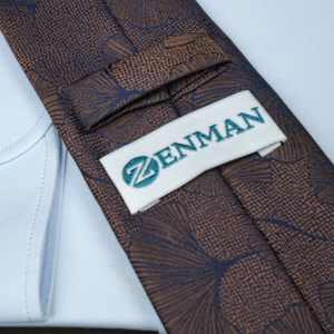 a close up of a tie with a label on it
