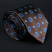 a close up of a tie on a black surface