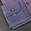a close up of a purple and blue checkered shirt