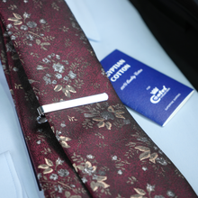 a close up of a tie on a table