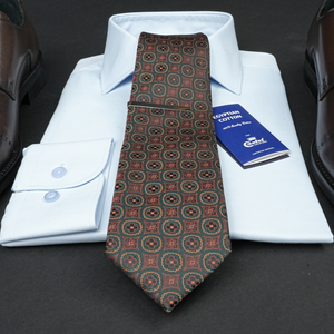 a close up of a tie and a dress shirt