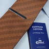 a close up of a tie on a table