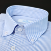 a close up of a blue and white checkered shirt