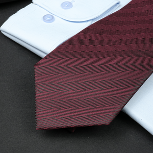 a close up of two ties on a table