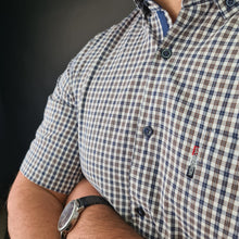 a close up of a person wearing a watch