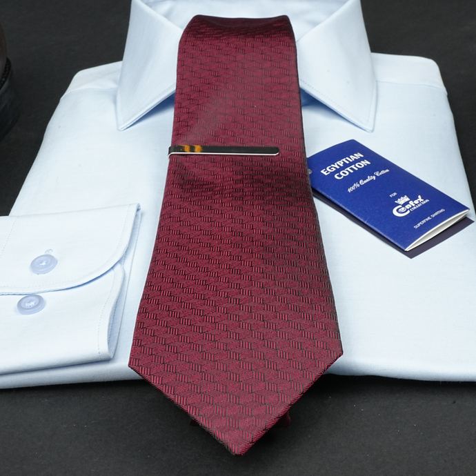 a close up of a tie and a shirt