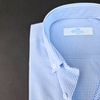 a close up of a blue and white checkered shirt