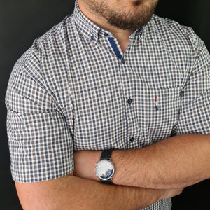 a man with a watch on his wrist